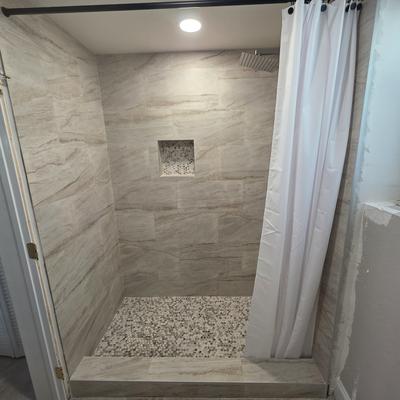 Remodelación de ducha símil piedra por Firenova